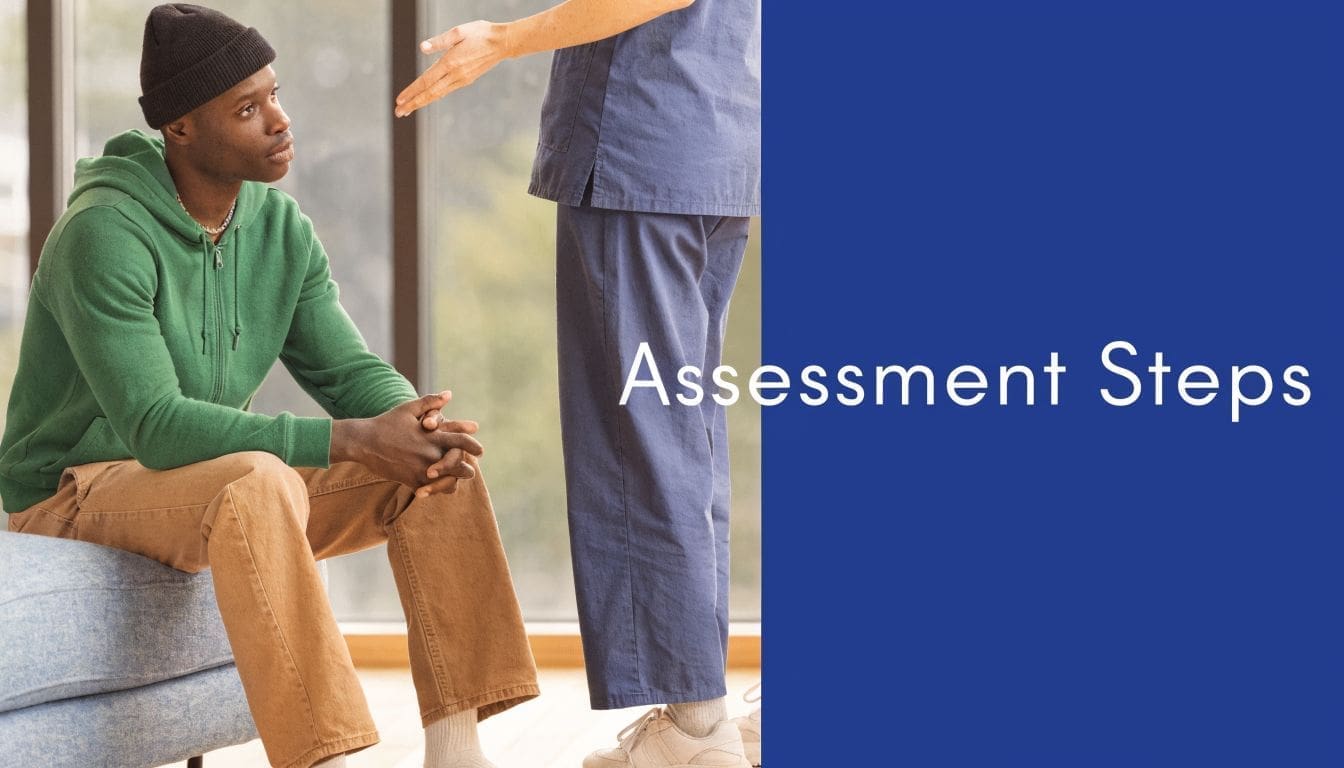 A healthcare professional talking to a young man sitting on a couch during an assessment session.