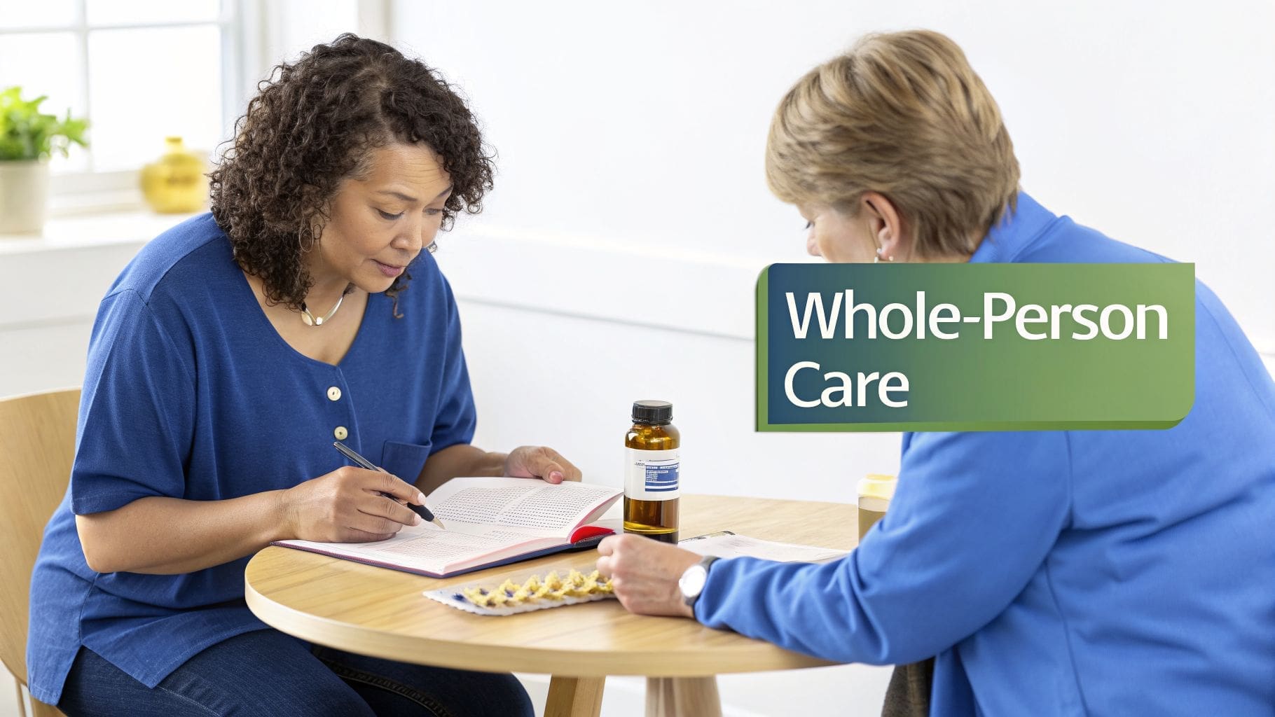 Two women discussing health and medication at a table, highlighting whole-person care.
